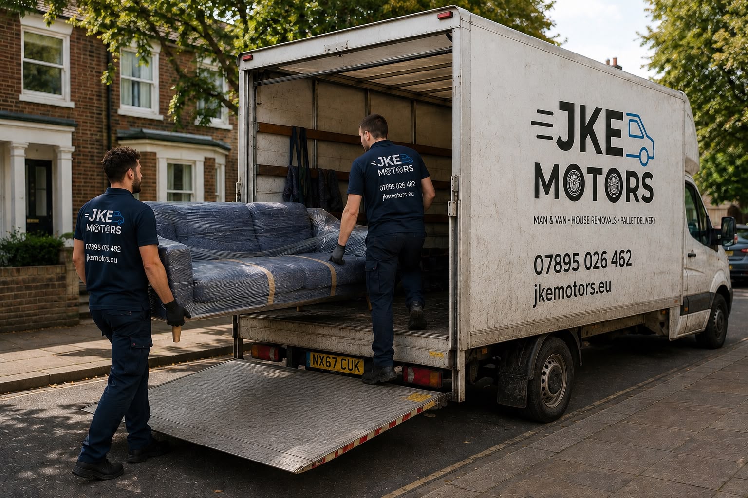 JKE Motors two-person crew loading a wrapped crate for marketplace collection in London